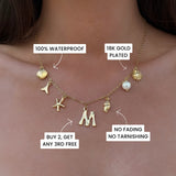 GOLD OCEAN LETTER NECKLACE